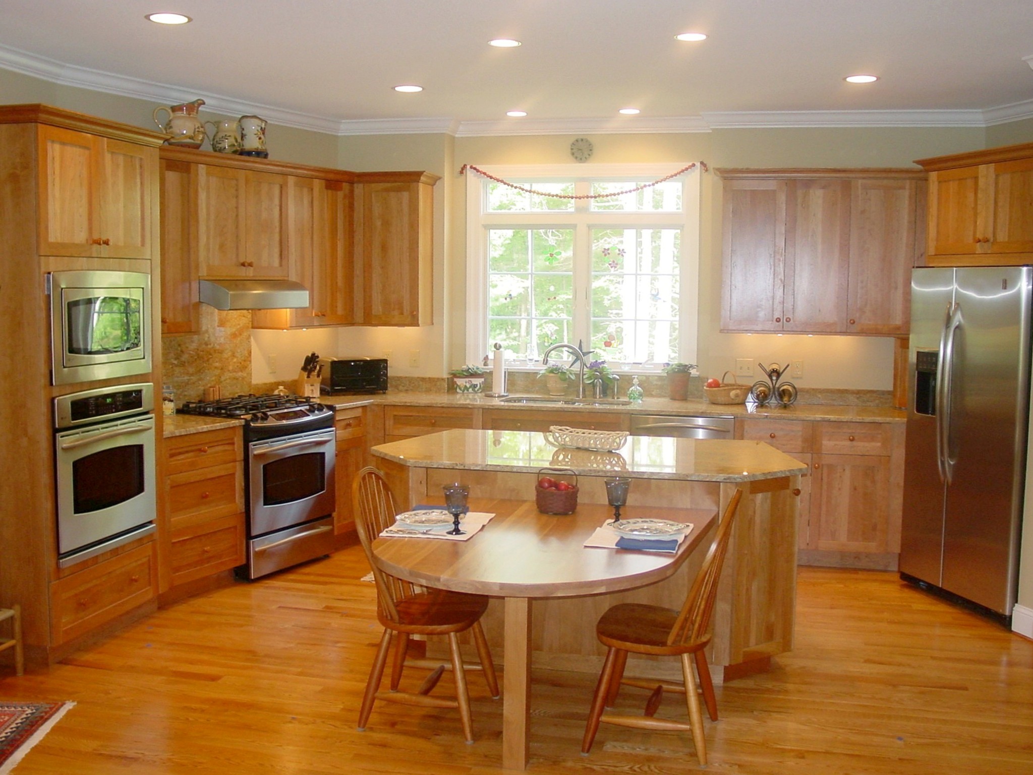 Adelphi Kitchens Cabinetry, Shaker Doorstyle in Natural Red Birch. GE Profile Appliances.