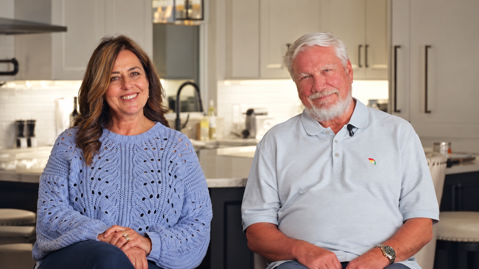 Isabel and Steve seated in their kitchen